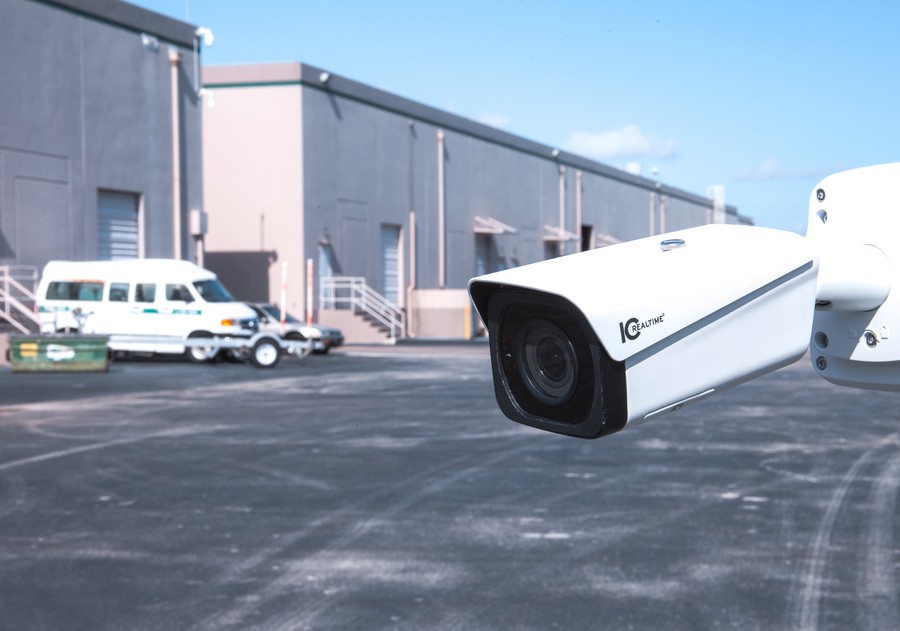 A commercial security system camera outside a warehouse. 